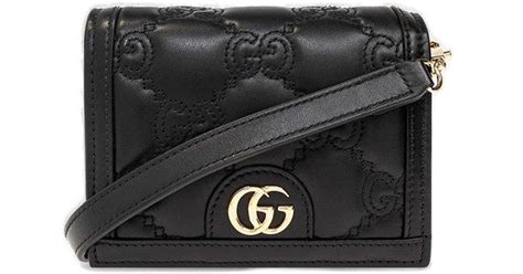 gucci gg matelassé chain linked mini bag